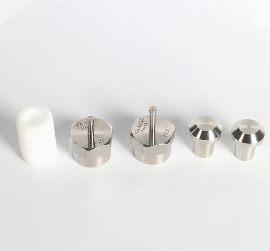 Five parts of coin cell simulator including stainless steel sleeve, Teflon body, and electrode rods